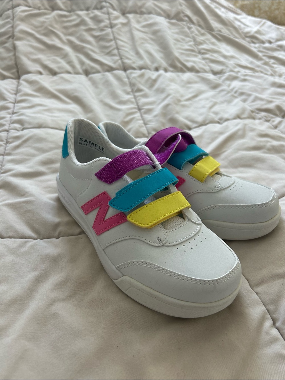 New Balance Kids White Sneakers with Pink, Teal and Yellow Straps